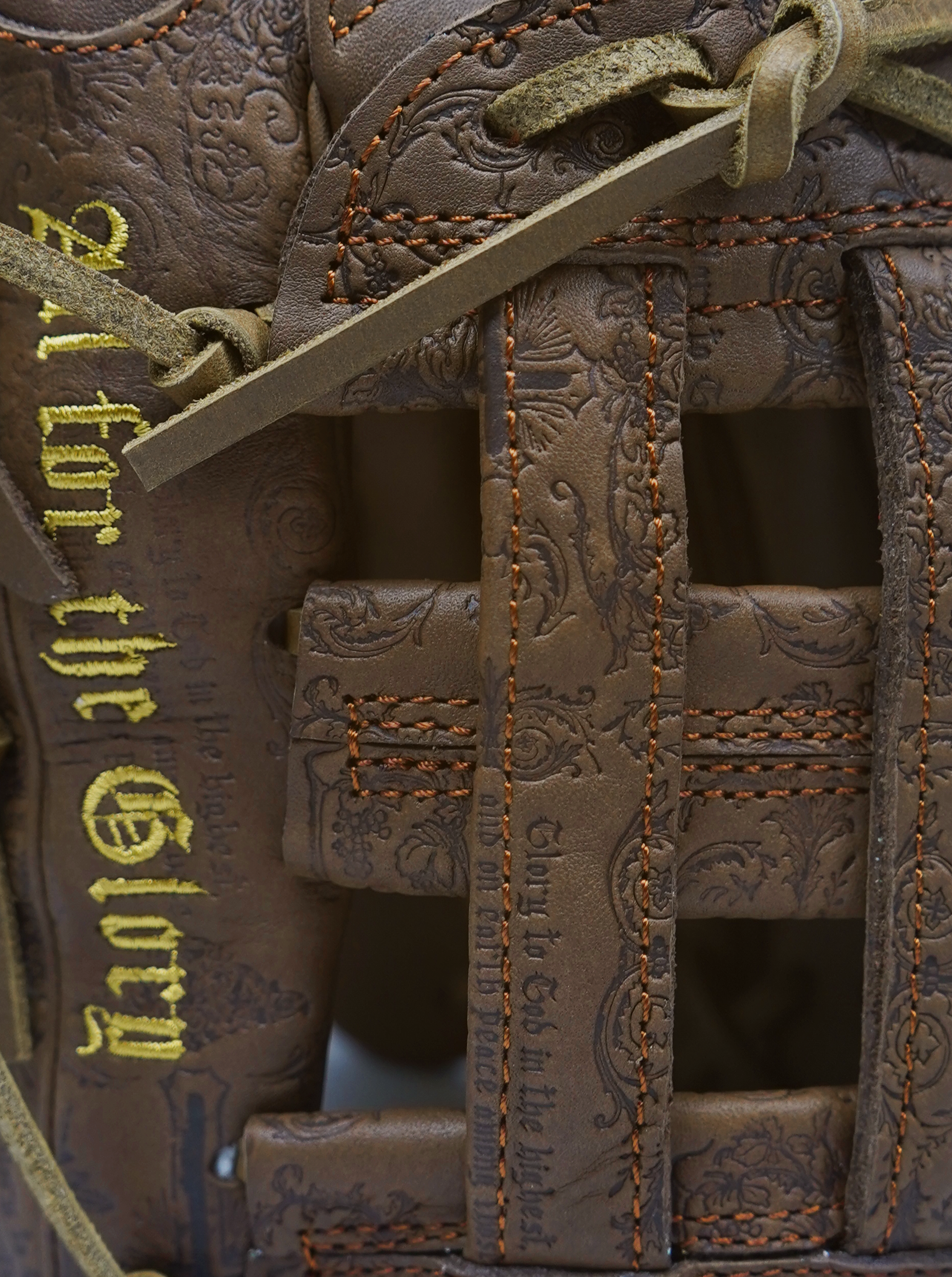 An extreme close-up of a brown leather VROBI