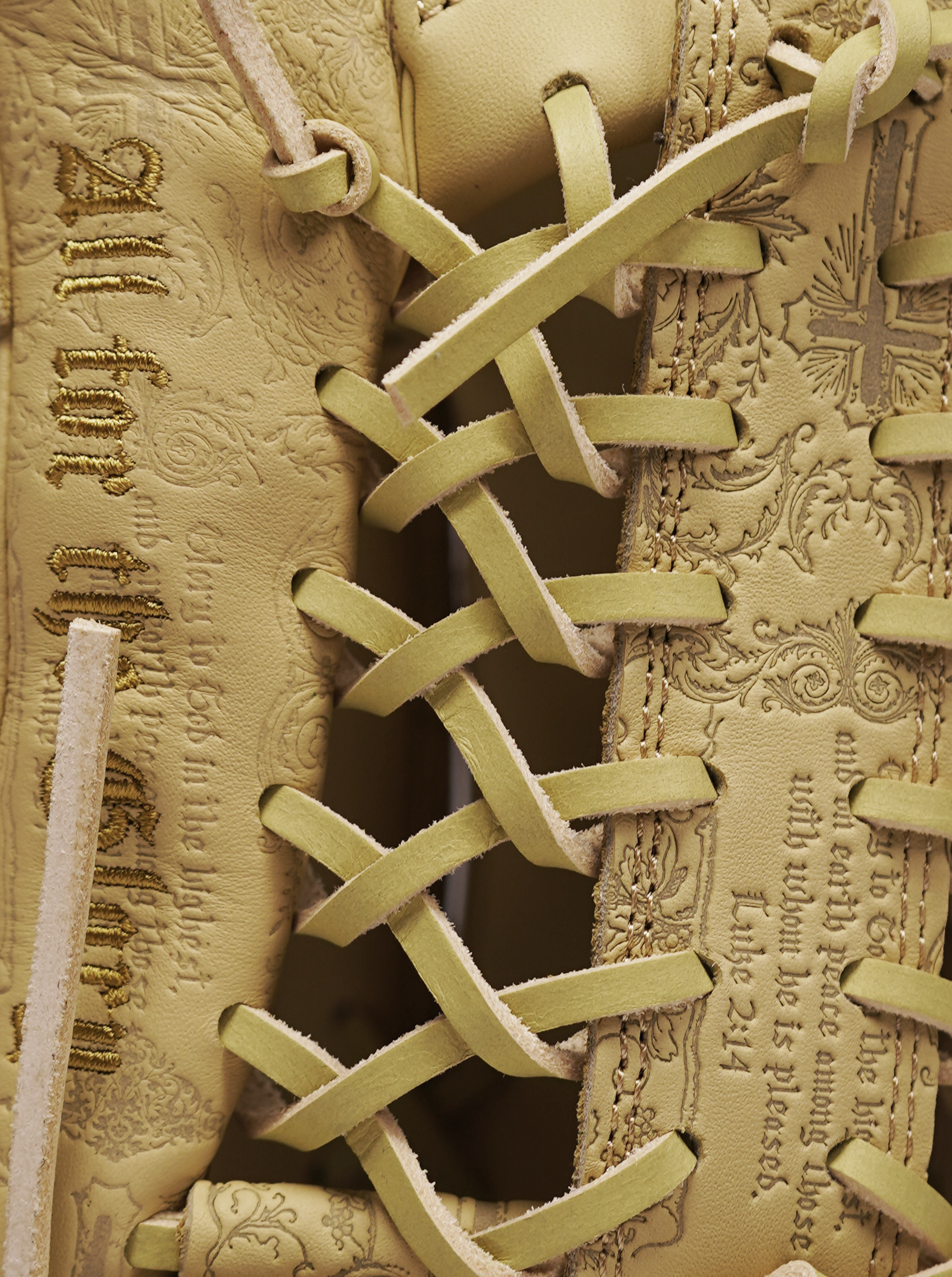 A high-angle, extreme close-up of a tan leather VROBI 