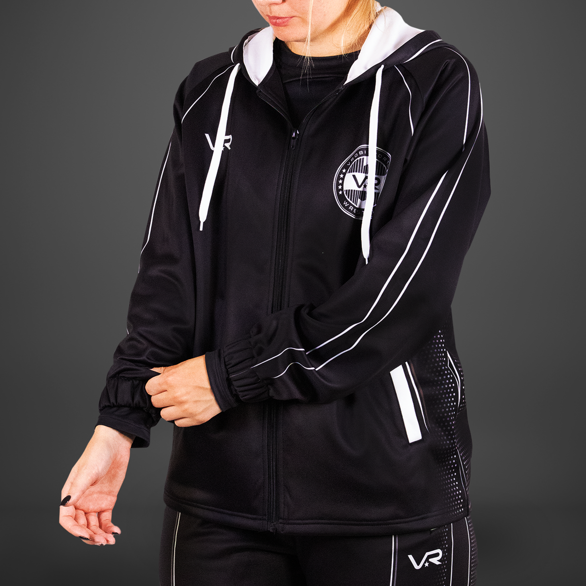 Black jacket with white accents and VR logo on a gray background